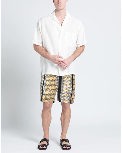 Universal Works Yellow Shorts & Bermuda Shorts for men