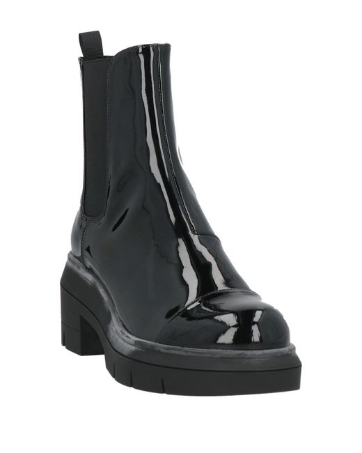 Bottines Stuart Weitzman en coloris Black