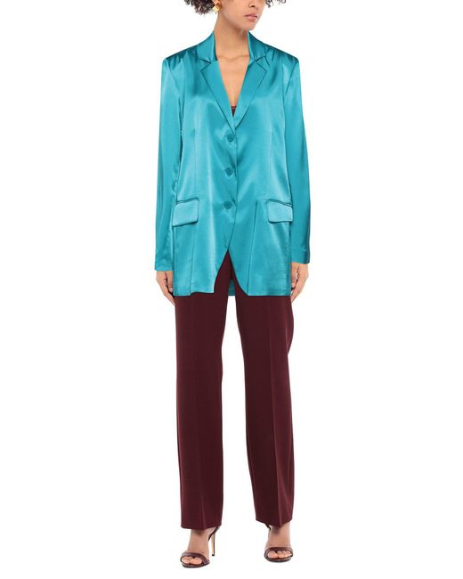 turquoise suit jacket