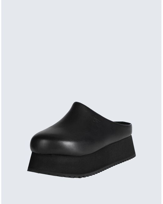 Mules & Zoccoli di Calvin Klein in Black