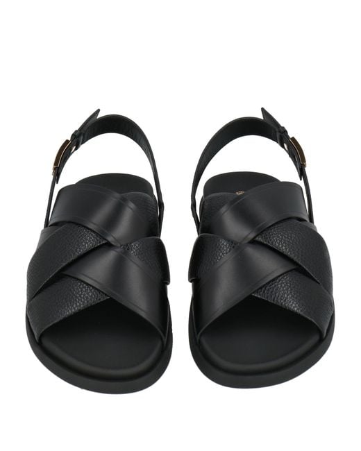 Tod's Black Sandals