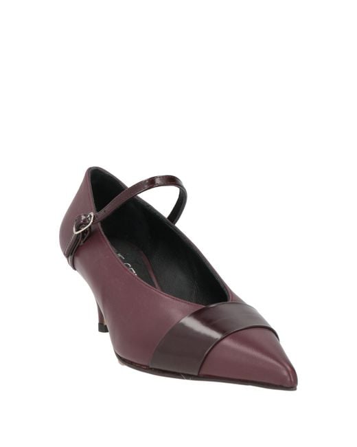 The Seller Purple Pumps
