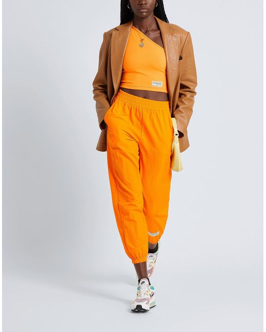 THE GIVING MOVEMENT x YOOX Orange Pants Recycled Nylon