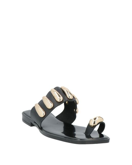 Ovyè White Thong Sandals
