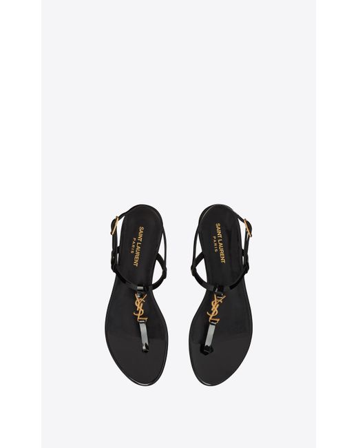 Saint Laurent Cassandra Flat Sandals In Patent Leather With Gold-tone ...