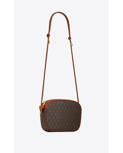 le monogramme camera bag in cassandre canvas and smooth leather