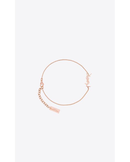 saint laurent opyum charm bracelet in gold brass