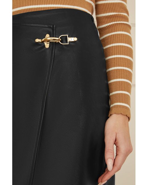 Yumi' Natural Faux Leather Wrap Mini Skirt