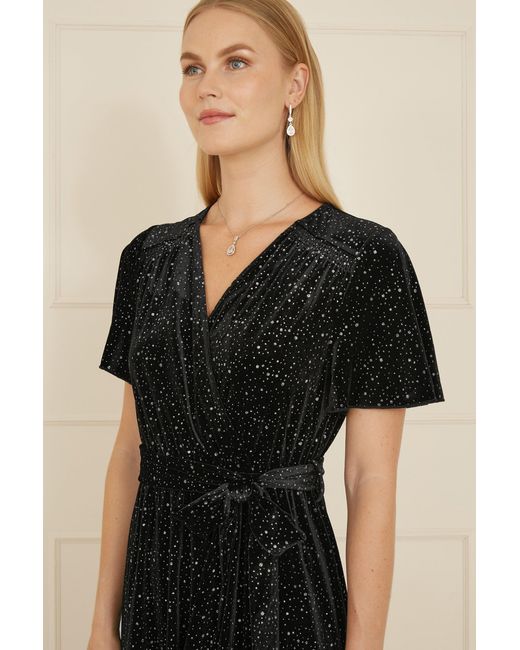 Yumi' Black Velvet Sparkle Wrap Angel Sleeve Dress