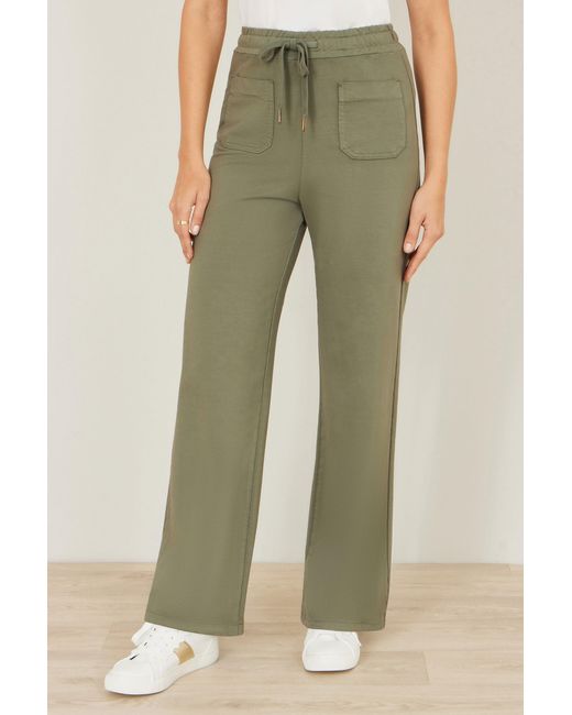 Yumi' Natural Relaxed Stretch Wide Leg Trousers With Pockets