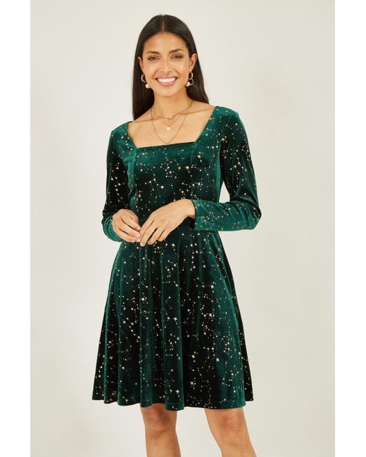 Yumi' Green Star Foil Print Long Sleeve Skater Dress