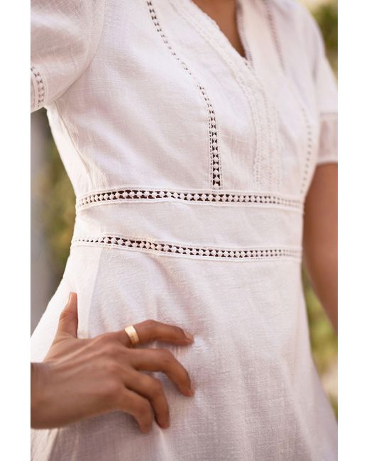 Yumi' White Lace Trim V Neck Dress