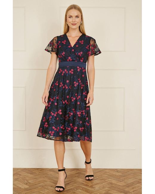 Yumi' Blue Embroidered Floral Mesh Wrap Midi Skater Dress