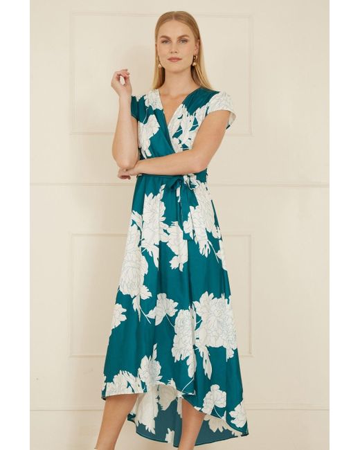 Yumi' Blue Blossom Print Wrap Midi With Dipped Hem