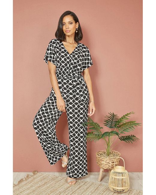 Yumi' Black Geometric Print Wrap Jumpsuit