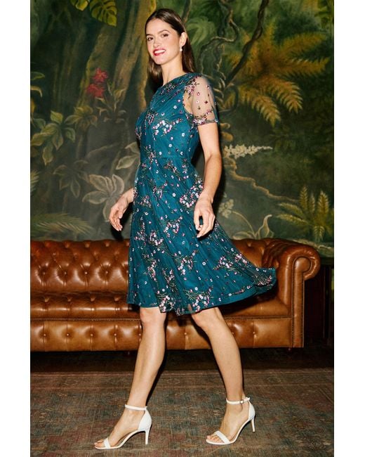 Yumi' Green Embroidered Floral Mesh Prom Dress