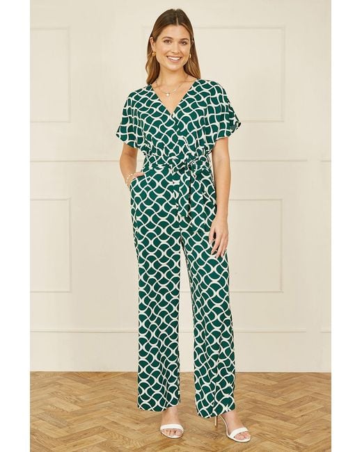 Yumi' Green Geometric Print Wrap Jumpsuit