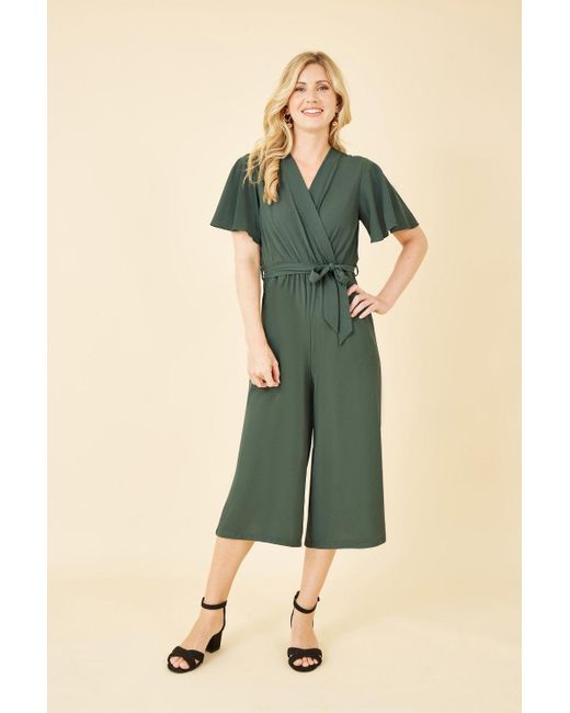 Mela London Green Mela Wrap Over Jumpsuit With Angel Sleeves