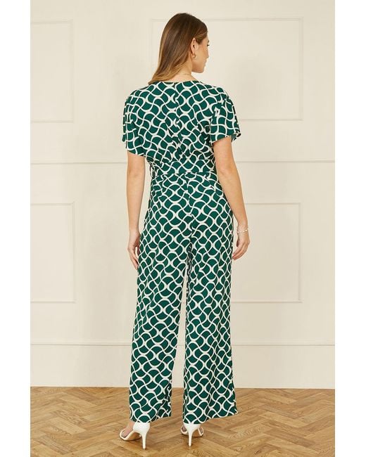 Yumi' Green Geometric Print Wrap Jumpsuit