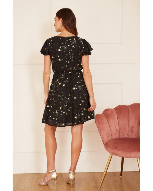Mela Black Foil Star Print Wrap Skater Dress