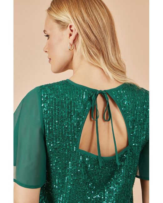Yumi' Green Sequin Top With Sheer Sleeves And Cut Out Back
