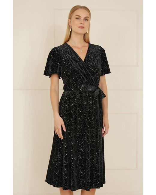 Yumi' Black Velvet Sparkle Wrap Angel Sleeve Dress