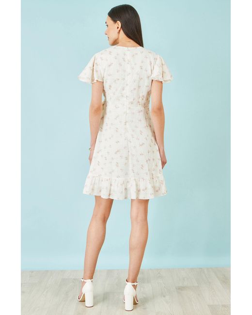 Yumi' White Rose Print Wrap Over Frill Dress