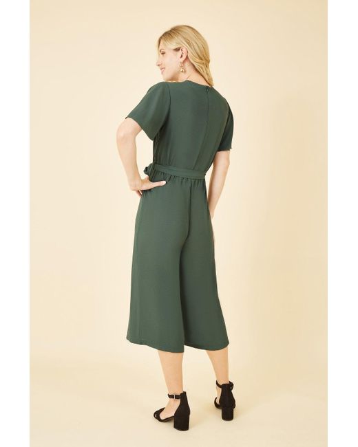 Mela London Green Mela Wrap Over Jumpsuit With Angel Sleeves