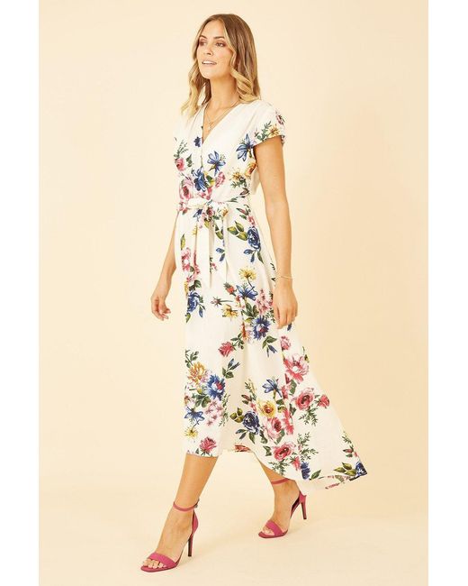 Mela Natural Ivory Floral Wrap Dip Hem Dress