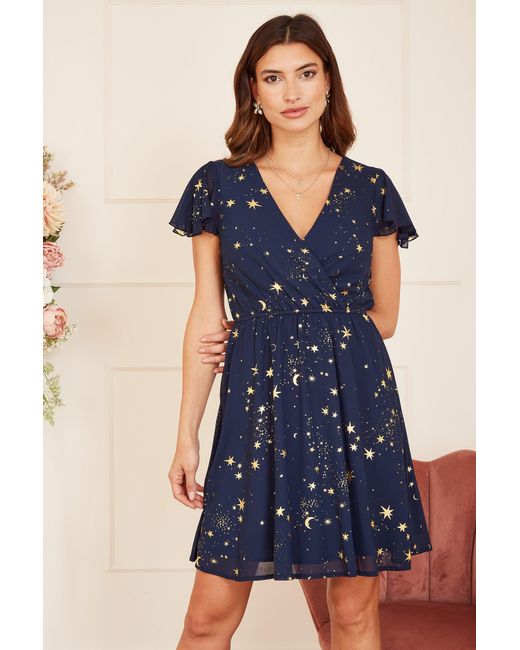 Yumi' Blue Mela Foil Star Print Wrap Skater Dress