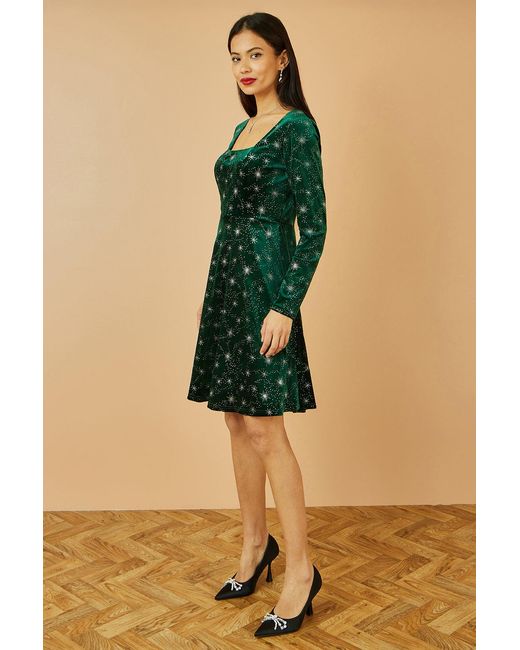 Yumi' Green Starburst Foil Print Long Sleeve Skater Dress