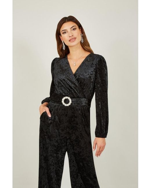 Yumi' Black Velvet Long Sleeve Jumpsuit With Diamante Belt