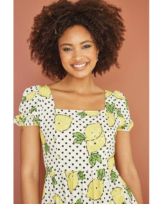 Mela White Viscose Lemon Print Skater Dress With Balloon Sleeves