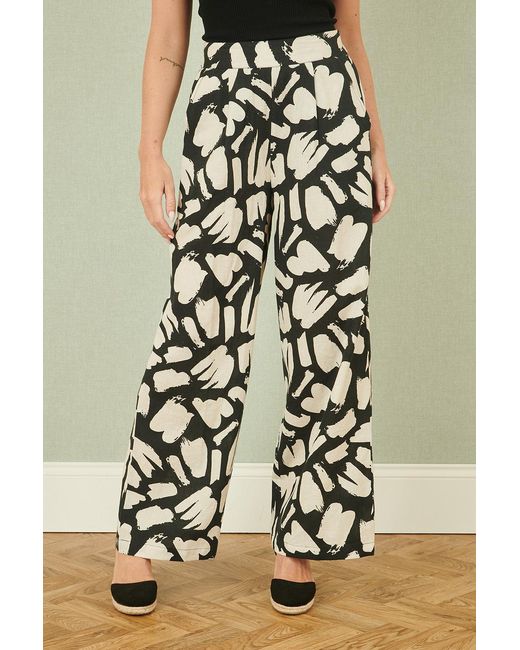 Yumi' Black Cotton Splash Print Relaxed Fit Trousers