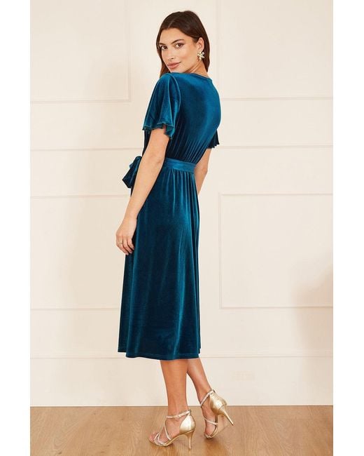Yumi' Blue Wrap Over Midi Dress With Angel Sleeves And Split Hem