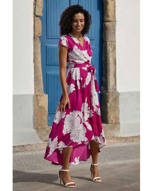 Yumi' Pink Blossom Print Wrap Dress With Dipped Hem
