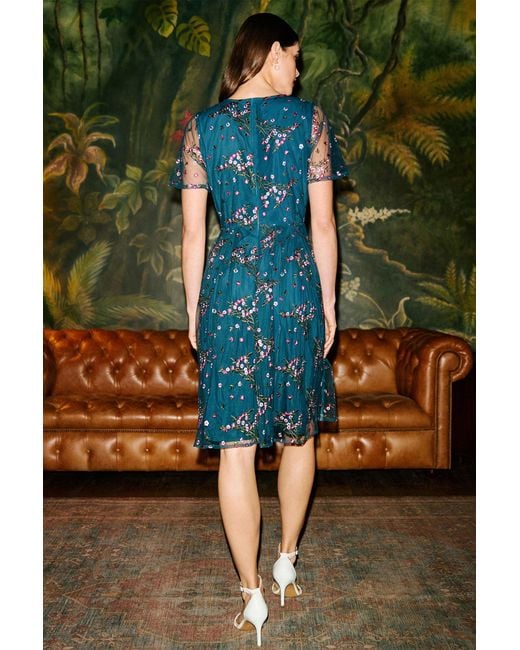 Yumi' Green Embroidered Floral Mesh Prom Dress