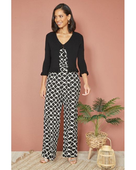 Yumi' Black Tie Up Ribbed Cardigan With Frill Hem