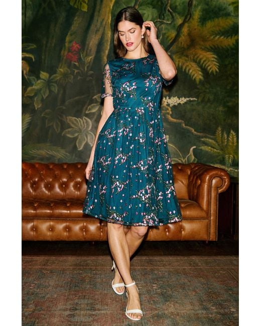 Yumi' Green Embroidered Floral Mesh Prom Dress