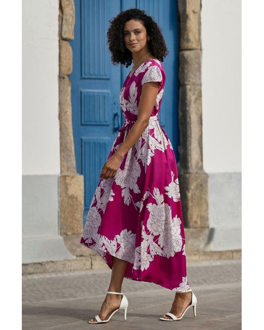 Yumi' Pink Blossom Print Wrap Dress With Dipped Hem