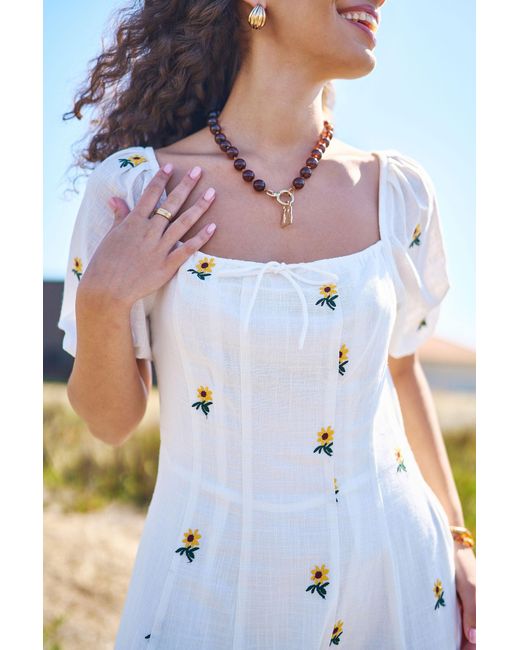 Yumi' White Cotton Sunflower Embroidered Midi Dress
