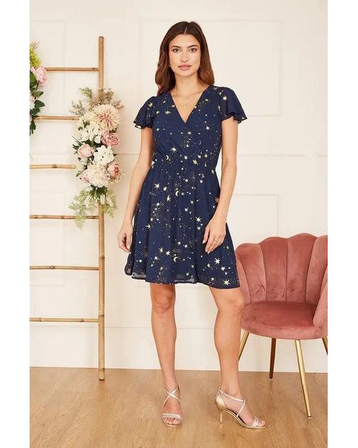 Yumi' Blue Mela Foil Star Print Wrap Skater Dress