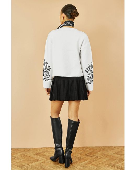 Yumi' Natural Knitted Pleated Mini Skirt