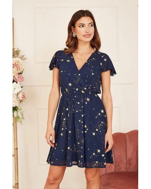 Yumi' Blue Mela Foil Star Print Wrap Skater Dress