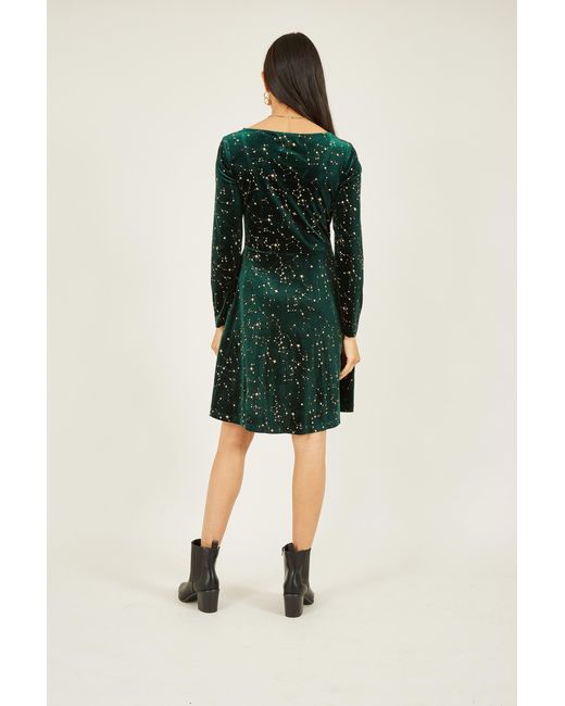 Yumi' Green Star Foil Print Long Sleeve Skater Dress