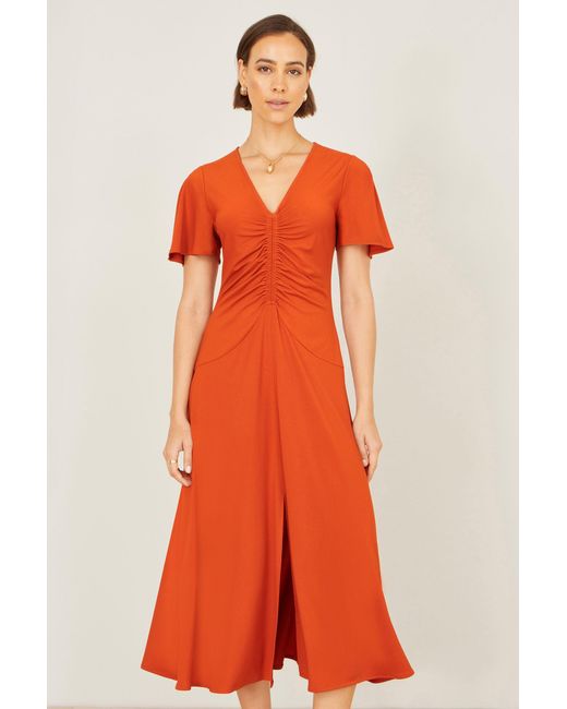 Yumi' Orange Ruched Front Stretch Midi Dress