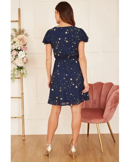 Yumi' Blue Mela Foil Star Print Wrap Skater Dress