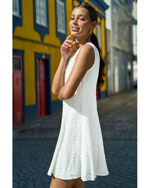 Yumi' Blue Cotton Applique Flower Swing Shift Dress