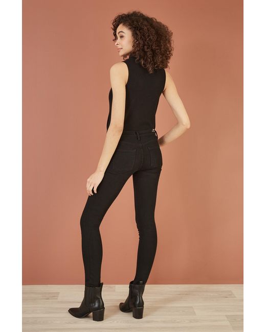 Yumi' Black Knitted Roll Neck Sleeveless Jumper