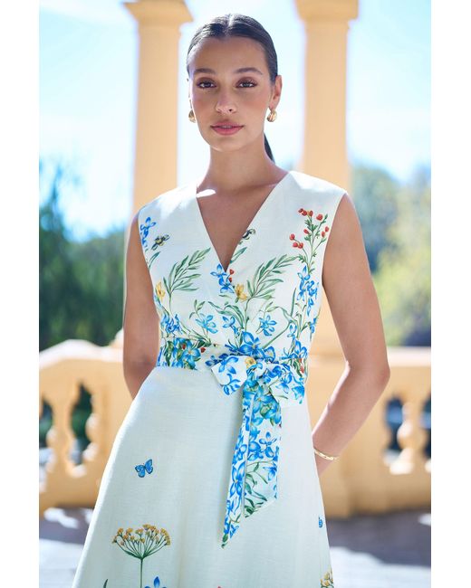 Yumi' Blue Butterfly Print Midi Wrap Dress